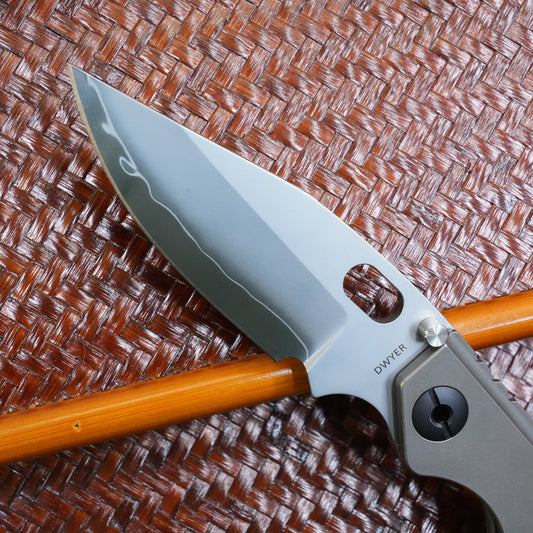 The initial prototype before production titanium handle.Only 1