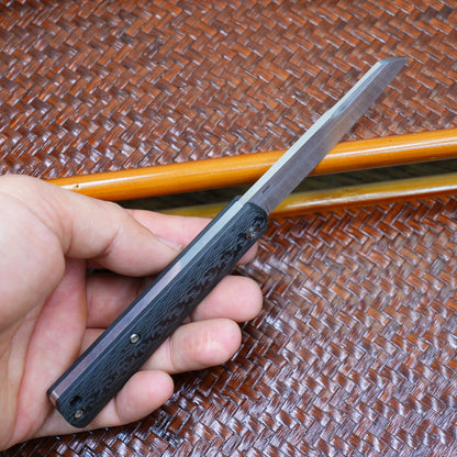 Production test Pocket knife with non-locking design, carbon fiber handle, M390, handmade satin finish.