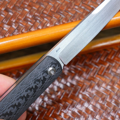Production test Pocket knife with non-locking design, carbon fiber handle, M390, handmade satin finish.