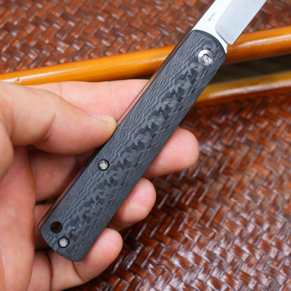 Production test Pocket knife with non-locking design, carbon fiber handle, M390, handmade satin finish.