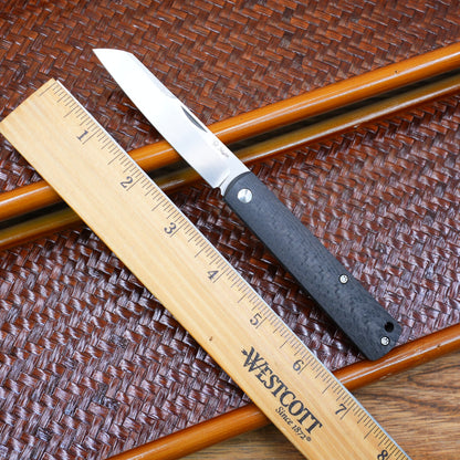 Production test Pocket knife with non-locking design, carbon fiber handle, M390, handmade satin finish.