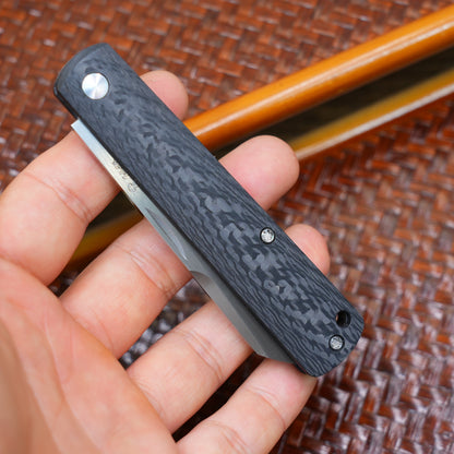 Production test Pocket knife with non-locking design, carbon fiber handle, M390, handmade satin finish.