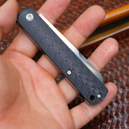 Production test Pocket knife with non-locking design, carbon fiber handle, M390, handmade satin finish.
