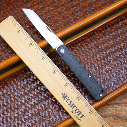 Production test Pocket knife with non-locking design, carbon fiber handle, M390, handmade satin finish.