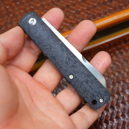 Production test Pocket knife with non-locking design, carbon fiber handle, M390, handmade satin finish.