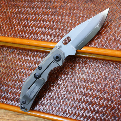 The initial prototype before production titanium handle.Only 1