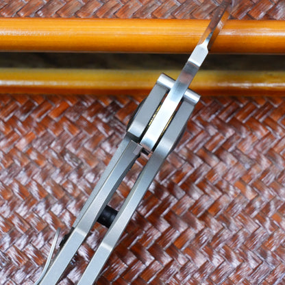 The initial prototype before production titanium handle.Only 1