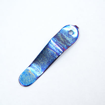 BBNM Titanium clips, shipping included.blue lightning pattern Just the clip, no knife included