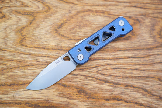 We Knife Company Snecx Tyro Superlock Folding Knife 2.91" CPM-20CV Stonewashed Drop Point Blade, Blue Machined Titanium Handles, Reversible Clip - WE24001-4