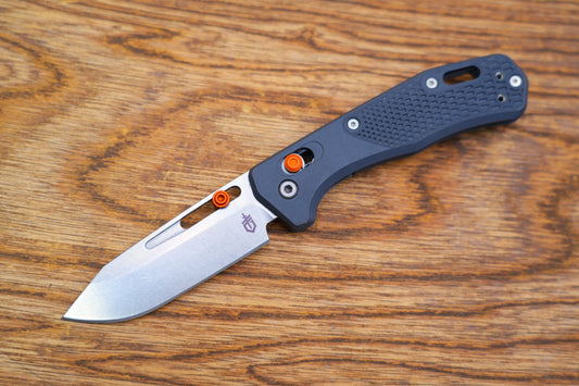 Gerber Assert Pivot Lock Folding Knife 2.98" S30V Stonewashed Clip Point Blade Blade, Textured Gray Handles with Red Accents, AXIS/Crossbar Lock - 30-001921