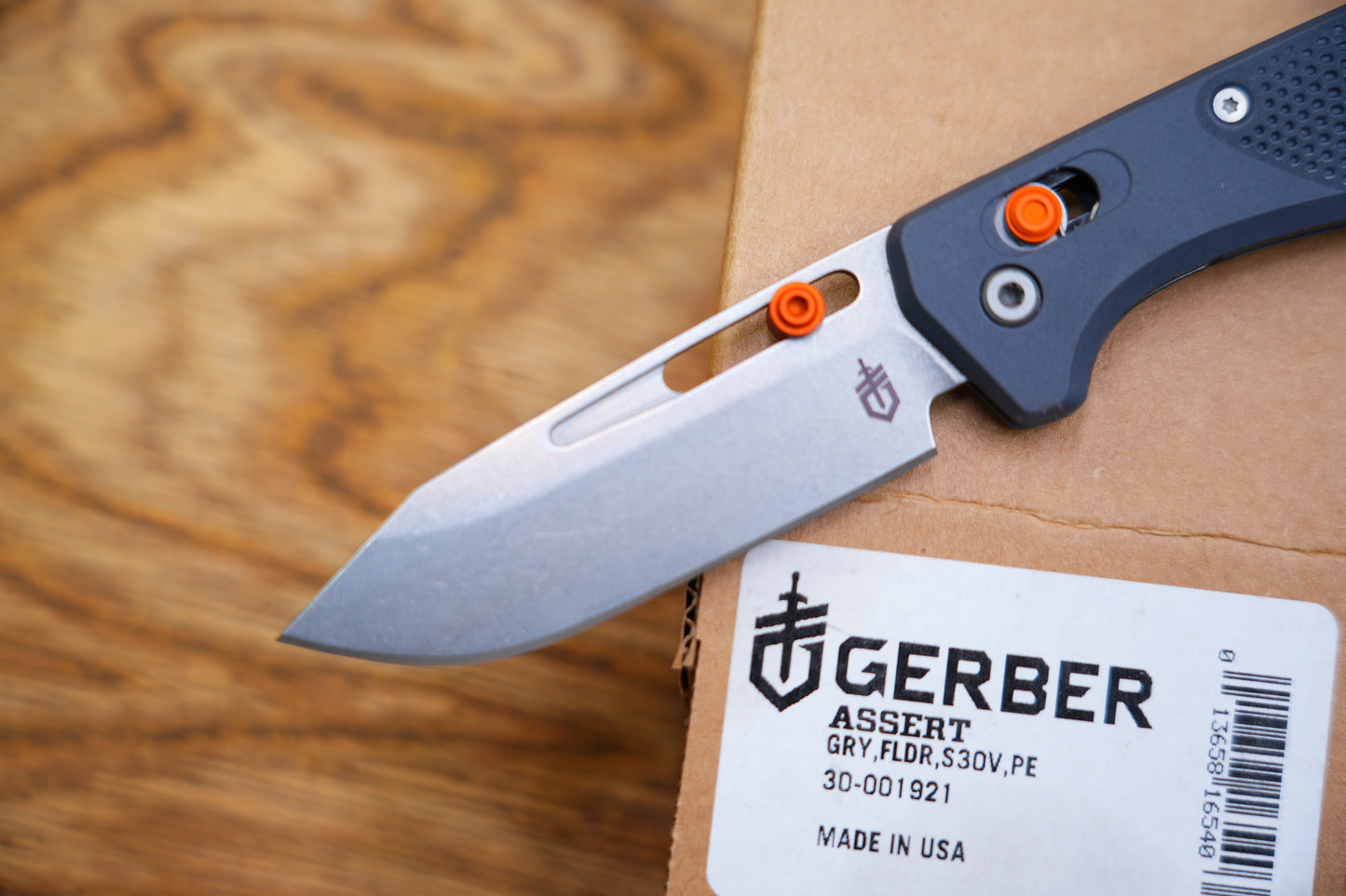 Gerber Assert Pivot Lock Folding Knife 2.98" S30V Stonewashed Clip Point Blade Blade, Textured Gray Handles with Red Accents, AXIS/Crossbar Lock - 30-001921