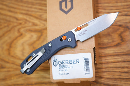 Gerber Assert Pivot Lock Folding Knife 2.98" S30V Stonewashed Clip Point Blade Blade, Textured Gray Handles with Red Accents, AXIS/Crossbar Lock - 30-001921