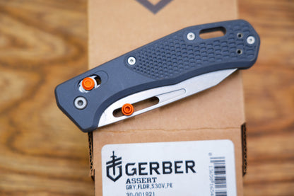 Gerber Assert Pivot Lock Folding Knife 2.98" S30V Stonewashed Clip Point Blade Blade, Textured Gray Handles with Red Accents, AXIS/Crossbar Lock - 30-001921